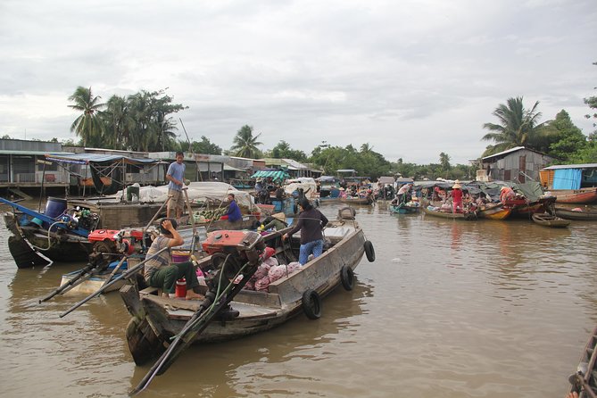 1-day Mekong Delta Tour: Cai Be Market, Local Island and Cycling - Cai Be Floating Market: Seeing Produce at Source