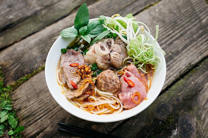 12 Tasting Street Food & Sightseeing By Scooter with Student - What This Ho Chi Minh City Scooter Tour Feels Like
