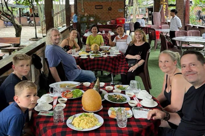 2-Day Mekong Delta Luxury Group Tour from Ho Chi Minh City - Ben Tre: fruit orchards, honey tea, and folk music with locals