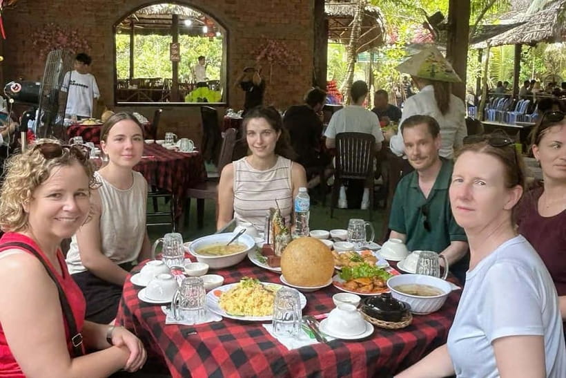 2-Day Mekong Delta Luxury Group Tour from Ho Chi Minh City - Monkey Bridge, rice vermicelli, and returning to Ho Chi Minh City by 5:00 PM