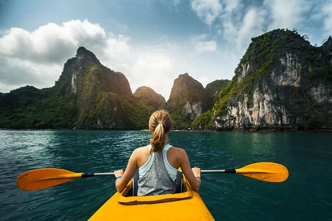 7 Days Package in Vietnam - Day 4: Halong Bay cruise with kayaking, swimming, and squid fishing