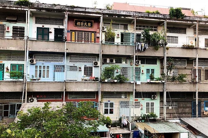 Afternoon Saigon Unseen Adventure by Scooter |Opt: Ao Dai Riders - Stop 2: Ho Thi Ky Flower Market, Grilled Oysters, and Market-Style Watching
