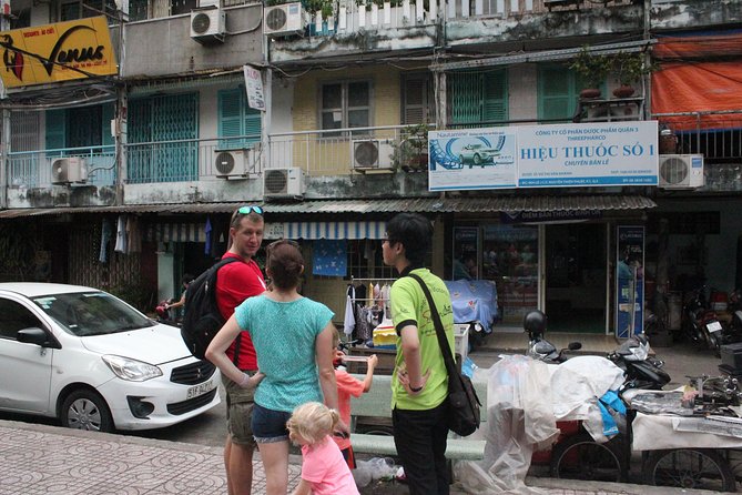 Afternoon Saigon Unseen Adventure by Scooter |Opt: Ao Dai Riders - Stop 4: District 4 Floating Market and Daily Work on Boats