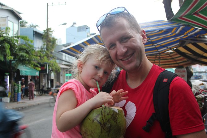 Afternoon Saigon Unseen Adventure by Scooter |Opt: Ao Dai Riders - Food and Drinks, Helmets, and Rain Ponchos: What You Don’t Have to Worry About