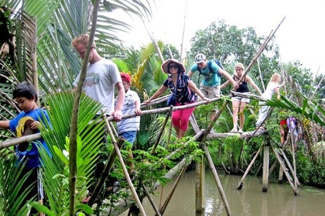 Authentic Mekong Delta: Tuk Tuk, Rowing Boat, Biking Tour - Vinh Trang Pagoda and the boat to Qui (Tortoise Islet)