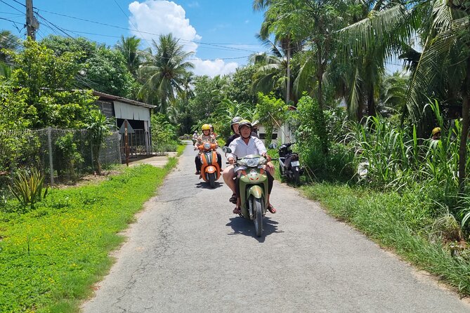Ben Tre Mekong Zig Zag: Scooter, Sailboat, and Food (Full day) - Stop 2: zigzag riding through villages and a traditional Mekong house