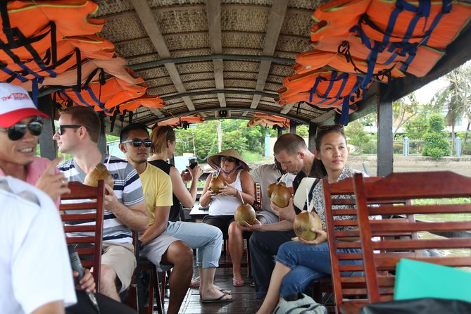 Cai Be Mekong Delta Tour: Cooking Class, Cycling & Craft Villages - The boat trip back and the return toward Ho Chi Minh City