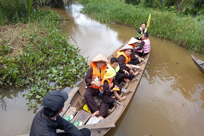 Cu chi Tunnel & Mekong Delta Full Day BBQ Lunch Lux Group 10 pax - Stretch break to Mekong Delta: lunch comes quick