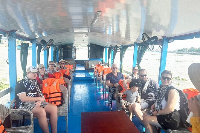 Cu Chi Tunnels and Mekong Delta 1 Day Tour from Ho Chi Minh City - Mekong Delta, second half: boat rides, Thoi Son orchard time, and sampan calm
