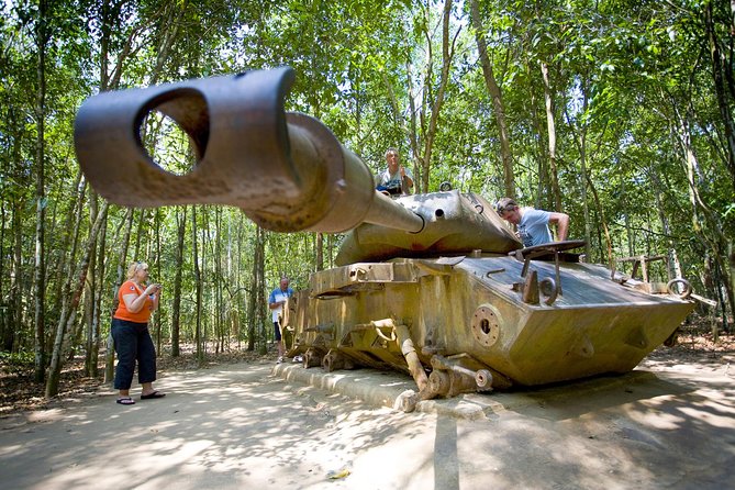 Cu Chi Tunnels Tour with LUNCH (Pho)-LESS TOURISTY-Max 7pax - The guided walk: narrow tunnels, trapdoors, and tank photos