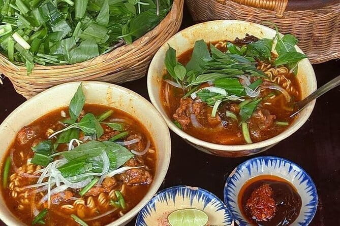 Discover Ho Chi Minh City’s Street Food & Hidden Life by Bicycle - Landmarks plus a historic weapon bunker: how the story connects