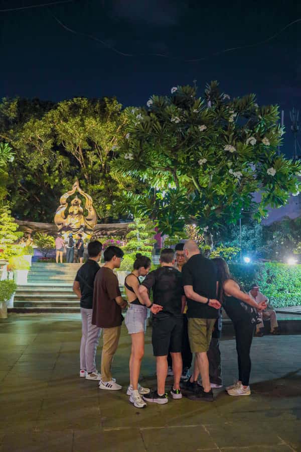 Discover Saigon Hidden Spots on Night Motorbike Adventure - Getting picked up and prepped: helmets, ponchos, and a quick briefing