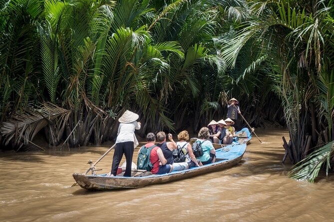 Essential Mekong Delta: Highlights Tour from Ho Chi Minh City - Tan Thạch Canal on a Traditional Sampan: Calm Water, Coconut Shade
