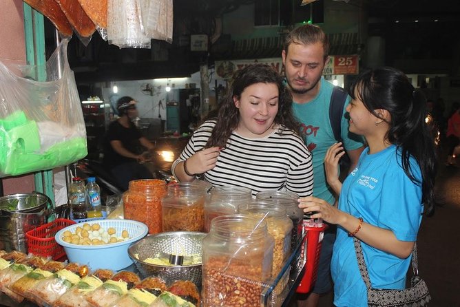 Food Tour by motorbike with local students - The guide matters: how local student guides change the night