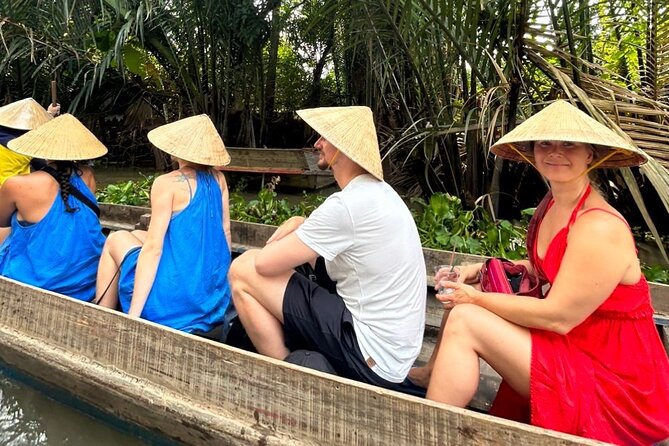 From HCM City: Mekong Delta Tour with Sampan Journey - Leaving My Tho: motorboat cruising past the dragon, phoenix, unicorn, and tortoise islets