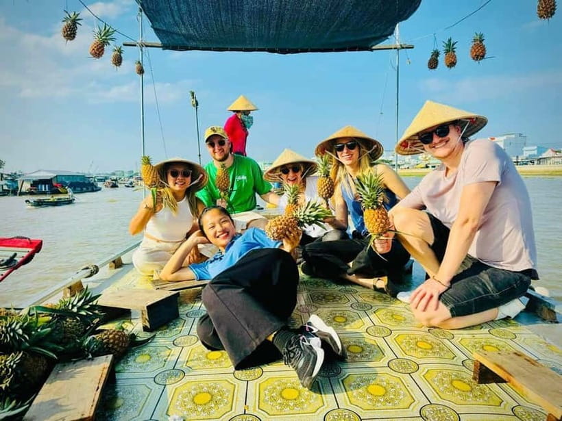 From HCMC: Cai Rang Floating Market & Mekong Delta Private - Cai Rang Floating Market at dawn: fish, fruit, and river rhythm