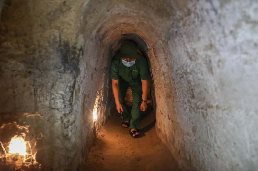 From Ho Chi Minh City: Cu Chi Tunnels and Agent Orange Tour - Tapioca, the uniform bunker, and Ho Chi Minh sandals from car tires