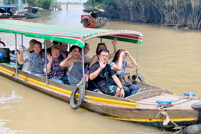 From Ho Chi Minh City: Discover Mekong Delta & Coconut Village - Ben Tre coconut village life: walk, tropical fruit, and the music set