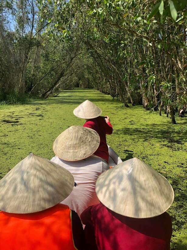 From Ho Chi Minh City: Tan Lap Floating Village Eco Day Tour - Wooden-Boat Canal Time: Water Lilies and Mangroves