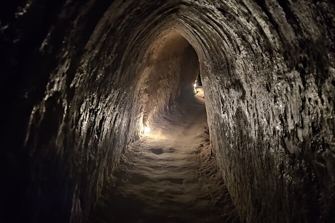 From Ho Chi Minh: Cu Chi Tunnels Half-Day History Tour with Guide - Documentary, command center, and the Hoang Cam smoke-less stove