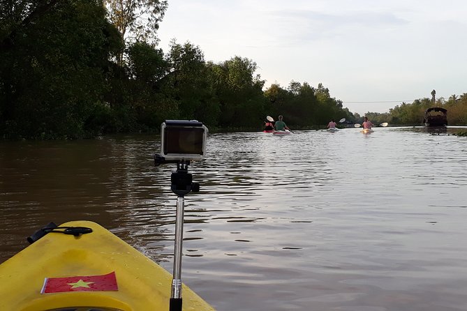 Full Day Experience Mekong River Life By Kayak & Boat. - Village conversation stop: a small taste of daily life