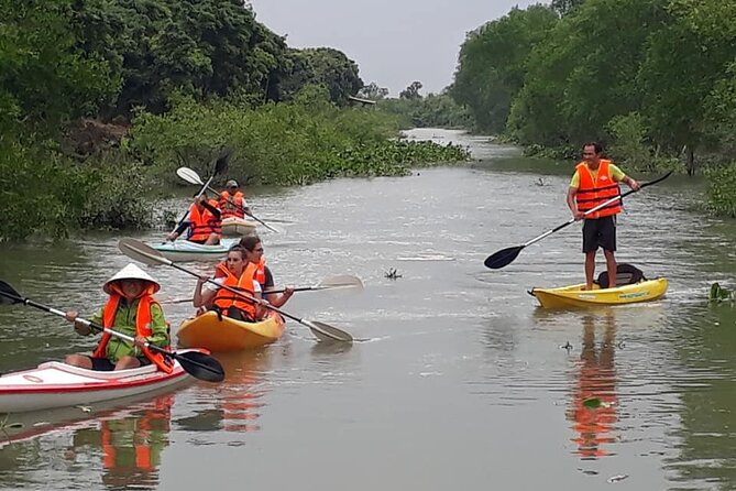 Full Day Experience Mekong River Life By Kayak & Boat. - Back toward Saigon: ending at the opera house meeting point