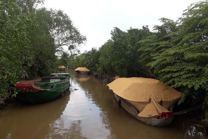 Full Day Experience Mekong River Life By Kayak & Boat. - Stop 1: Cai Be Floating Market and seasonal fruit on the move