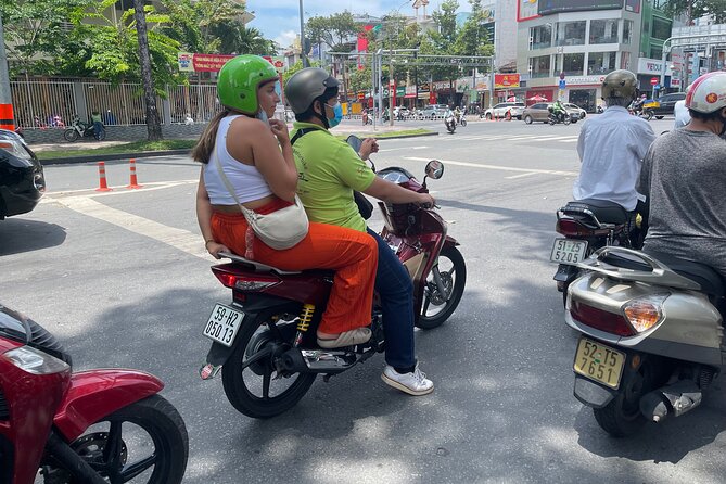 Good Morning Saigon Tour by Motorbike and Scooter - District 4 street scenes: the city in switch-on mode