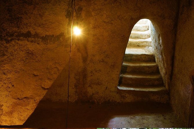 Half-Day Cu Chi Tunnels Guided Exclusive Experience with Pick Up - The tour rhythm: documentary, living areas, and trap-door reality