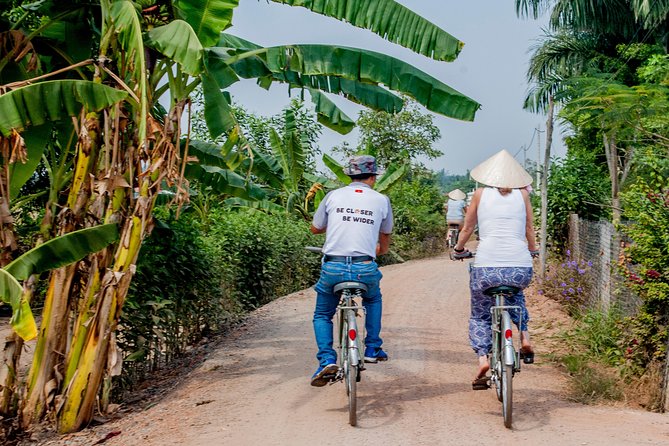Half-Day Mekong Delta by Speedboat and Leisure Biking - Riverside market and canal sampan: the part that most clearly feels local