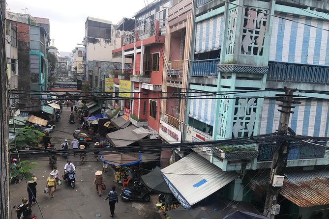Half-Day Private Scooter Tour Including Light Meal - District 8 riverside: a different Saigon mood