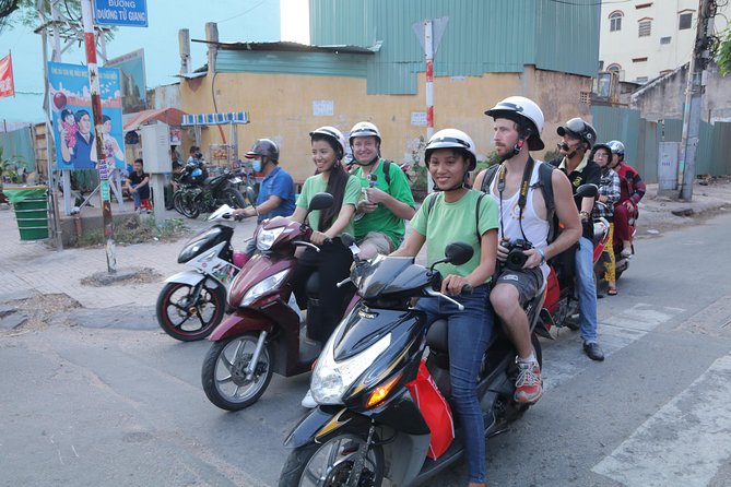 Half-Day Private Scooter Tour Including Light Meal - The food and coffee stops: banh mi bread, sticky rice, and a café in an alley