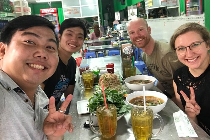 HCM City Local Street Food by scooter/ Aodai Rider Saigon tour - Stop 1 in Ho Chi Minh City: seeing daily life beyond the postcard