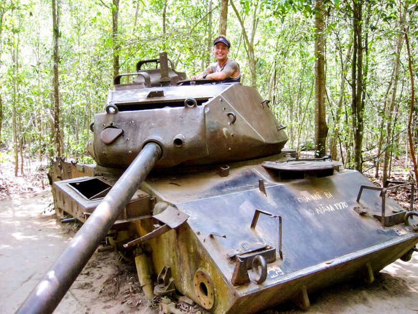 HCM: Cu Chi Tunnels & Mekong Delta with Coconut Village Tour - Coconut canals and village visits: Fruit, honey tea, and folk music