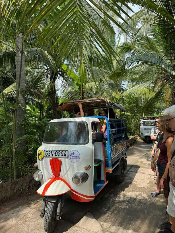 HCM: Mekong Delta Islands Boat & Tuk-Tuk Tour with Tastings - Canal life by rowboat, then the Mekong by motorboat