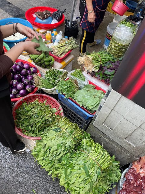 HCMc:Vietnamese Cooking Class with Local market tour & Meal - The class drinks, then the meal you share with your group