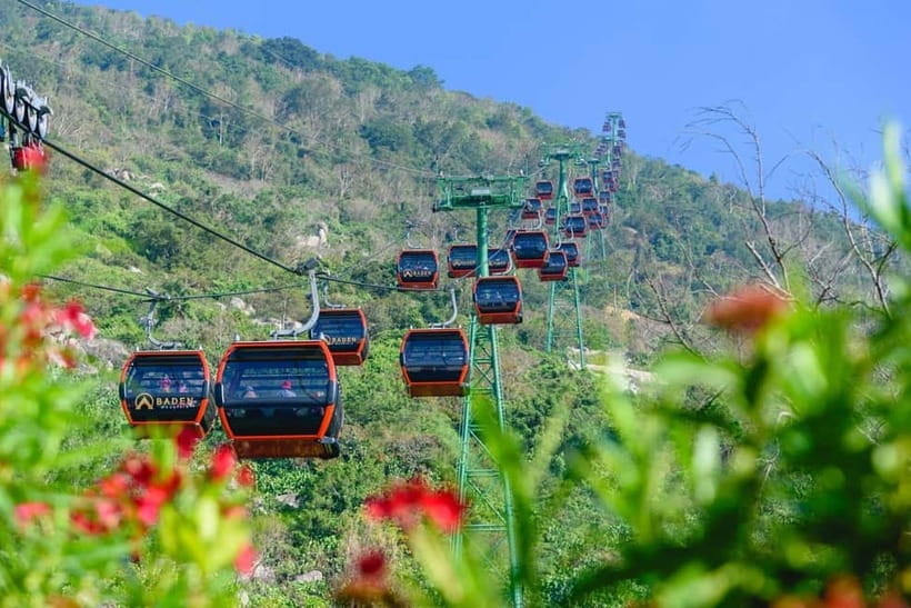 Ho Chi Minh: Black Virgin Mountain Cable Car &Cao Dai Temple - The walk up Bà Đen: laughing Buddha, lotus pagoda, and hidden tunnels