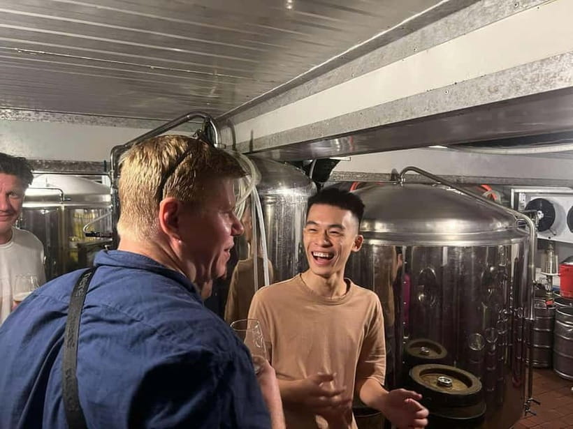 Ho Chi Minh City: Craft Beer and Local Food Tour by Scooter - Rain, traffic, and staying comfortable through the whole ride