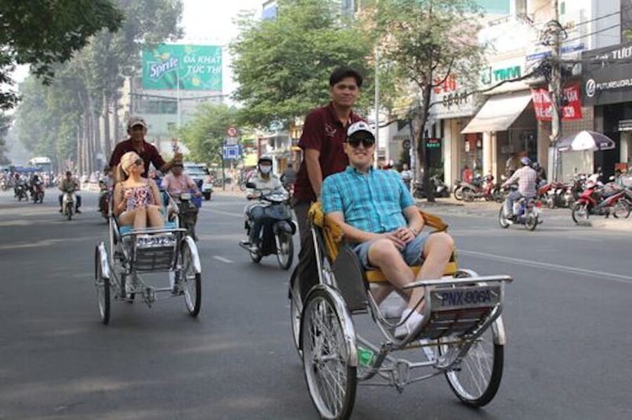 Ho Chi Minh City Cyclo Tour with English Speaking Guide - Pickup in District 1 and a private-group ride you control