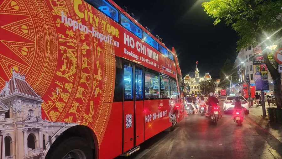 Ho Chi Minh City: Late-Night Open-Top Bus Tour - The big thing to know: no hop-on hop-off and no audio by default