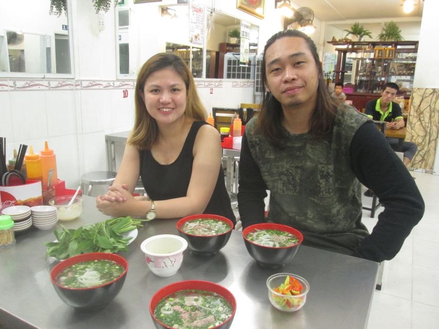 Ho Chi Minh City: Midnight Motorbike Tour - Floating market for tropical fruits: a playful stop