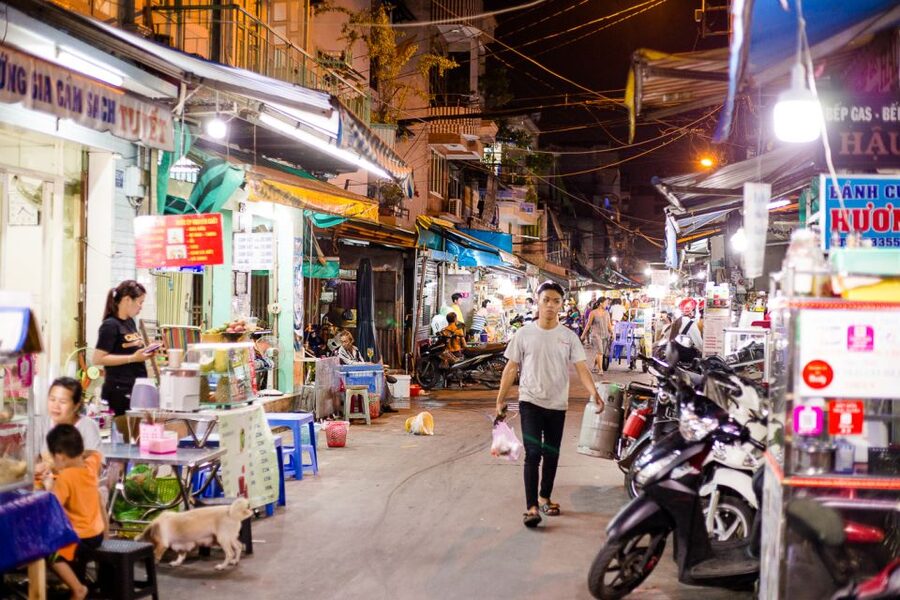 Ho Chi Minh City: Private Street Food Evening Walking Tour - Pickup, taxis/Grab rides, and how the 4 hours are paced