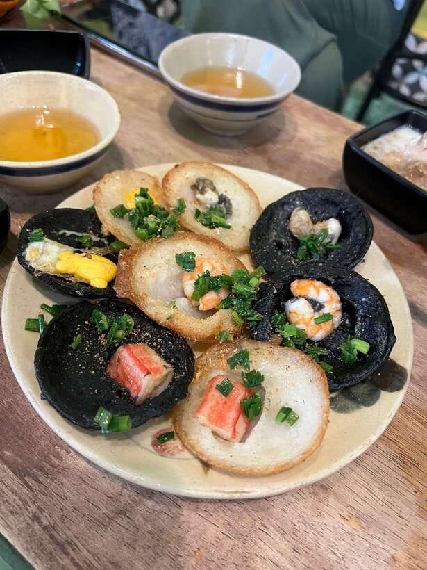 Ho Chi Minh City Street Food Private Tour With Female Guide - What you’ll eat: spring rolls, Vietnamese pizza, and more