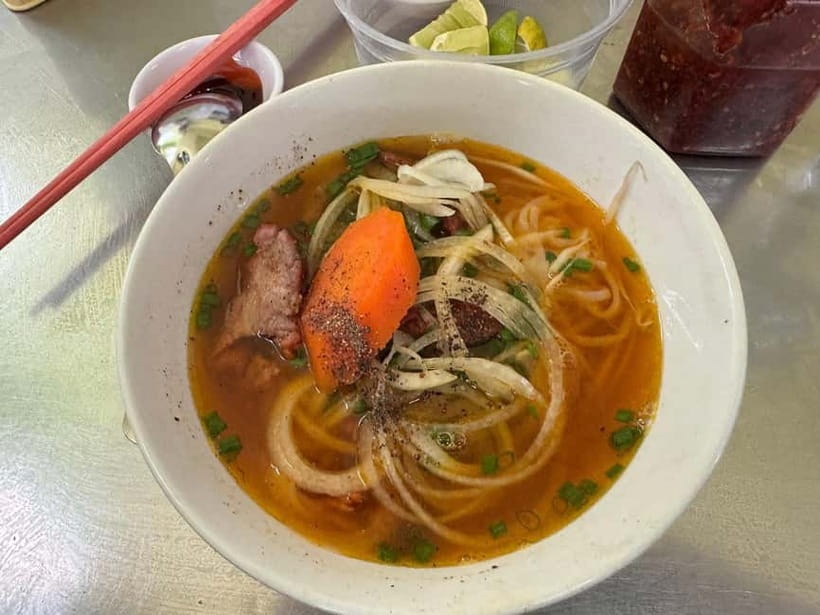Ho Chi Minh City: Super Niche Walking Street Food Tour - Hotel Pickup, Grab Rides, and the 2.5 km Walking Pace