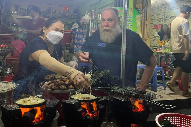 Ho Chi Minh Food Tour on Back of Motobike with Local Guide - Your 4-Hour Loop: Streets, Apartments, Flowers, and Ba Son Bridge