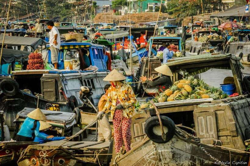 Ho Chi Minh: Group Cai Rang Floating Market 1 Day Tour - Pop rice, traditional cakes, and the flying menu lunch