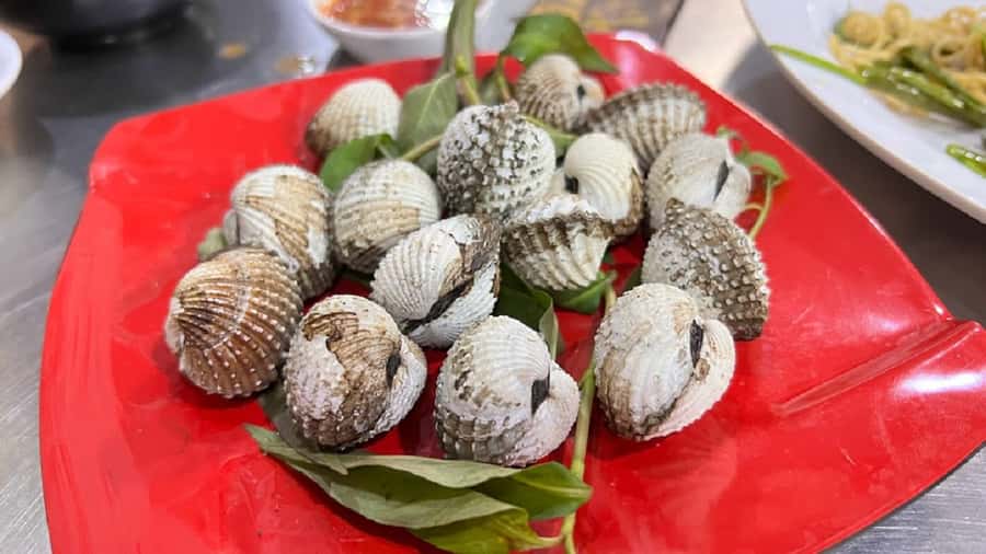 Ho Chi Minh: Saigon Street Food Walking Tour - The three tastings: Bo La Lot, Chao Long, and Hu Tieu