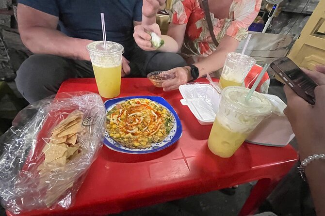 Ho Chi Minh Street Food and Sightseeing By Motorbike - Price and value: $30 for a scooter street-food tour