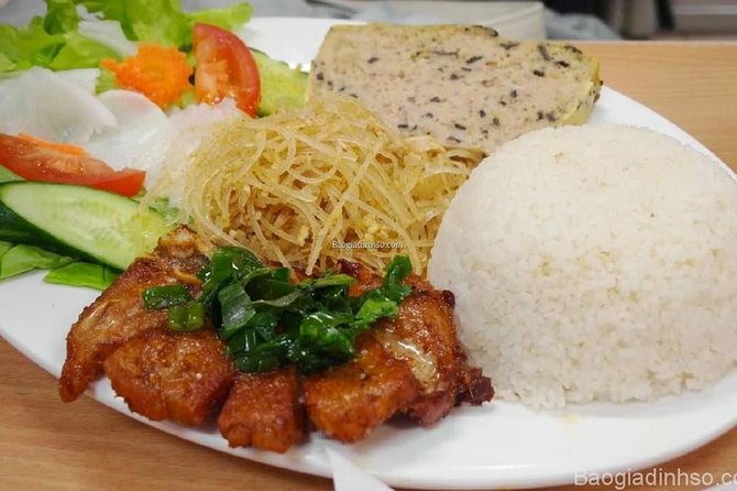 Ho Chi Minh Street Food Tour By Motorbike (Unique & Authentic) - Stop 1 in District 3: Chuối nếp nướng at the corner of real life
