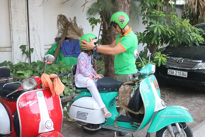 Ho Chi Minh Vespa City Tour 4,5 hours - Pickup, professional riders, and what the ride feels like